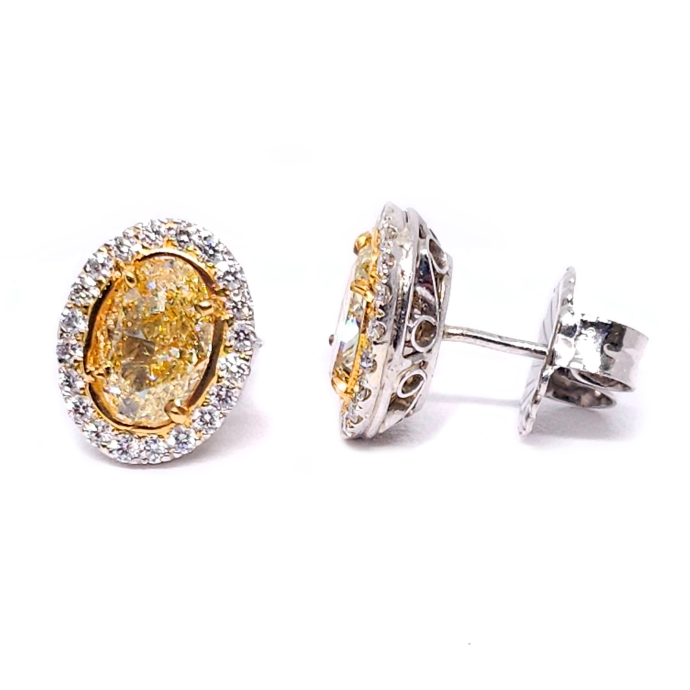 Diamond Yellow Oval Halo Stud Earrings 3.13 Carats in Platinum and 18K Yellow Gold with GIA Certificate