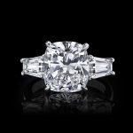 Diamond Cushion Cut 5.59 carats Engagement Ring with Tapered Baguette. Platinum. GIA