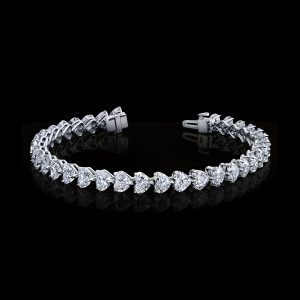 Diamond  Heart Shape Tennis Bracelet 17.21 carats  18KWG. Color DE Clarity VVS/VS