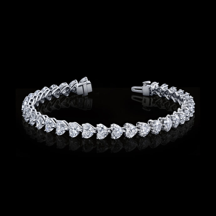 Diamond Heart Shape Tennis Bracelet 17.21 carats 18KWG. Color DE Clarity VVS/VS